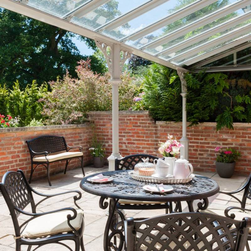 media/image/Heathfield-Estate-16-Flora-table-AB-4-kate-chairs-Jasmine-July-bench-stone-cushions-breakfast-food-patio-garden.jpg