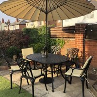 Vorschau: Customer photo of the June 6 seater garden table and chairs in antique bronze with stone cushions and parasol